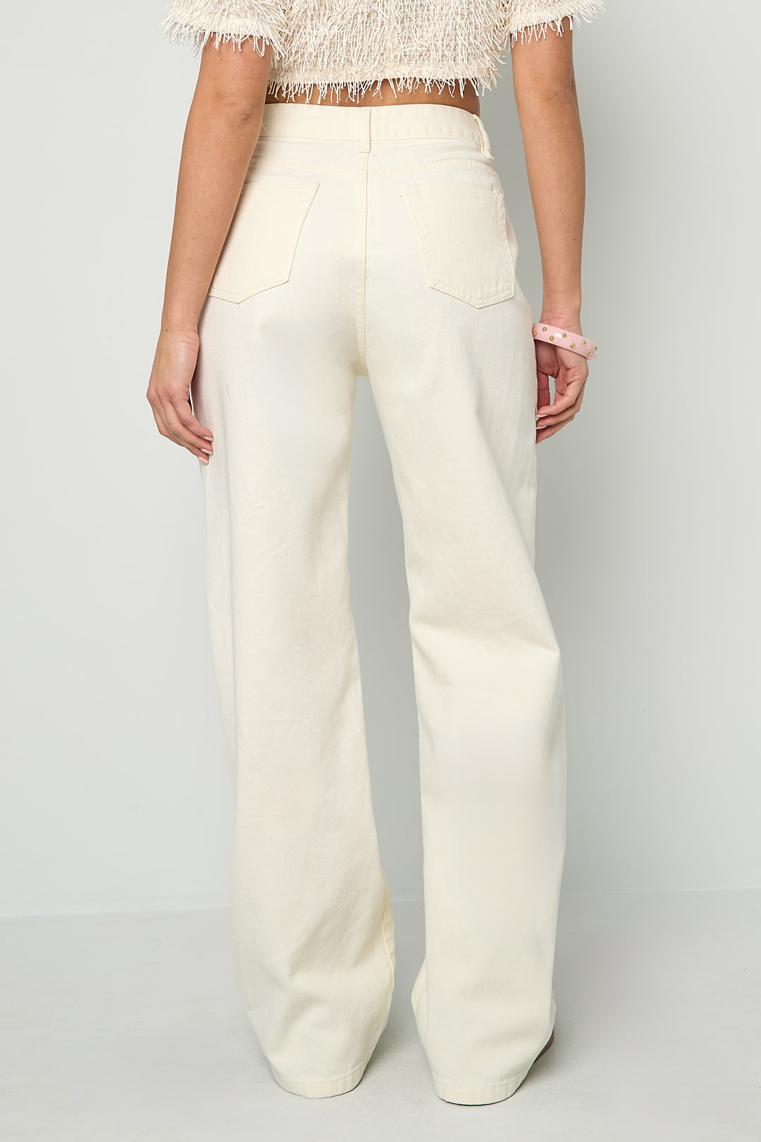 Jeans met vetersluiting